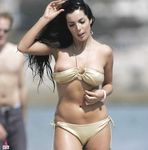 Busty chick shows her naked body at the nude beach