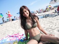 Couple enjoy time on nude beach