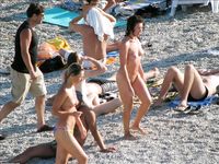 Raven haired goddess nudist shows off her body