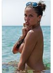 Helping Hand at the Nudist Beach