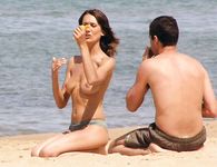 Helping Hand at the Nudist Beach