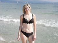 Helping Hand at the Nudist Beach