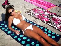 girl relaxing on nude beach