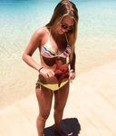 girl relaxing on nude beach