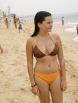 girl nudists get naked and heat up a public beach