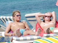 girl nudists get naked and heat up a public beach