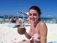 Adult naturist friends naked together at the beach