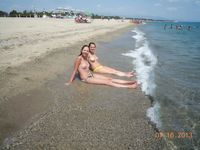 Curvaceous nude teen poses in the warm water