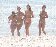 Hot babe sunbathes on nude beach