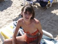 Check out this nudist showing off her shaved pussy