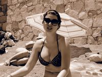 Check out this nudist showing off her shaved pussy