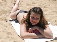 Check out this nudist showing off her shaved pussy