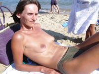 Check out this nudist showing off her shaved pussy