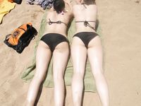 Check out this nudist showing off her shaved pussy