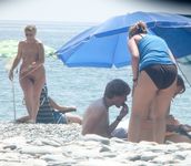 Everyone's looking at this sexy slim adult naturist