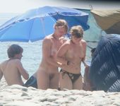 Everyone's looking at this sexy slim adult naturist