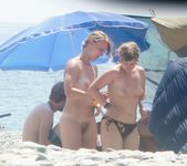 Everyone's looking at this sexy slim adult naturist
