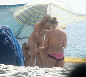 Everyone's looking at this sexy slim adult naturist