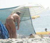 Everyone's looking at this sexy slim adult naturist
