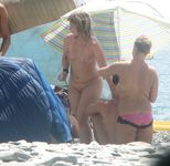 Everyone's looking at this sexy slim adult naturist