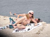 One Naturist Woman at an Outdoor Ping Pong Table