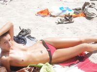 All eyes are on this adult naturist as she sunbathes