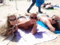 All eyes are on this adult naturist as she sunbathes
