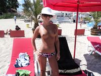Hot naked dance gets an all over tan at the beach
