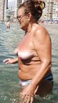 Amazing adult naturist hops on the back of a jet ski