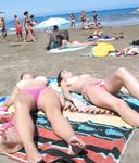 Barely legal nudist beach teen tans her whole body