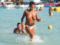 Barely legal nudist beach teen tans her whole body