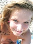 Barely legal nudist beach teen tans her whole body