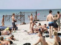 Elena Shows Off Her Pussy On NON-Nude Beach!
