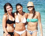 Castrated sissy at the nude beach