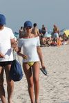 Curvy young nudist lets the sun kiss her body