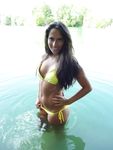 Dark haired nudist beach teen gets an all over tan