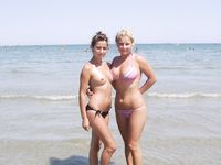 Hot Russian nudist strips her bikini off here