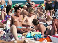Hot Russian nudist strips her bikini off here