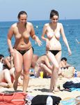 A public beach can't keep these girl nudists down