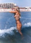 Bouncy breasted nudist teen strips and bares all