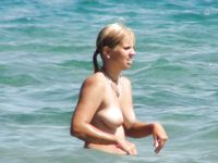 Hi!She is my lovely and beautiful wife, a nudist women.