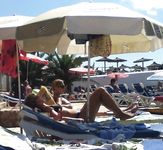 Check out gorgeous wet nudists having some fun