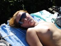 Amazing shots of a gorgeous nudist babe sunbathing