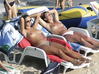 Adult adult naturist lays naked at the beach