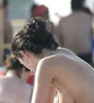 Adult adult naturist lays naked at the beach