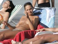 Adult adult naturist lays naked at the beach