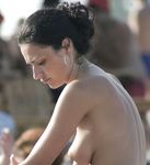 Adult adult naturist lays naked at the beach