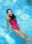Beautiful fresh faced adult plays at the beach nude