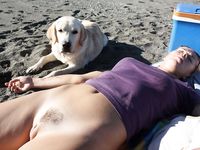 girl relaxing on nude beach