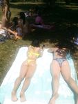 Nude Beach Sunbathing in Sunglasses on a White Towel